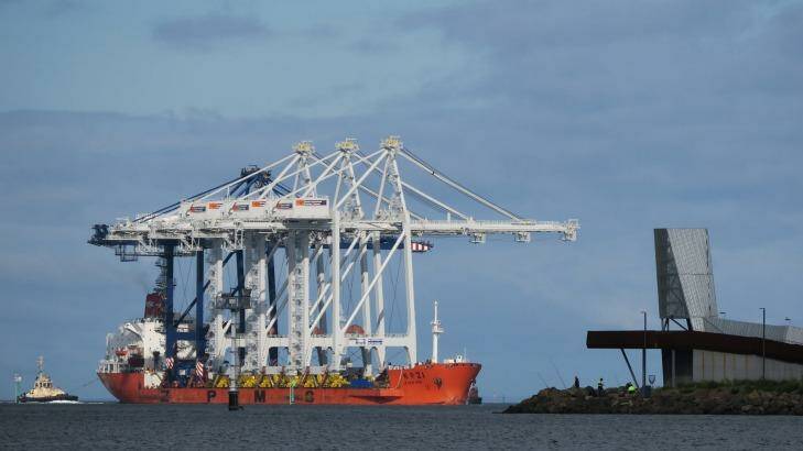 A container ship arrives at the Port of Melbourne.