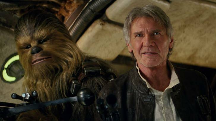 Chewbacca (left) and Harrison Ford as Han Solo in a still from Star Wars: The Force Awakens.
