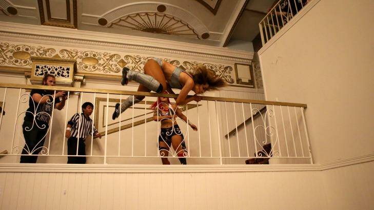 Kellyanne throws Evie over a railing during their Melbourne City Wrestling match. Photo: Pat Scala