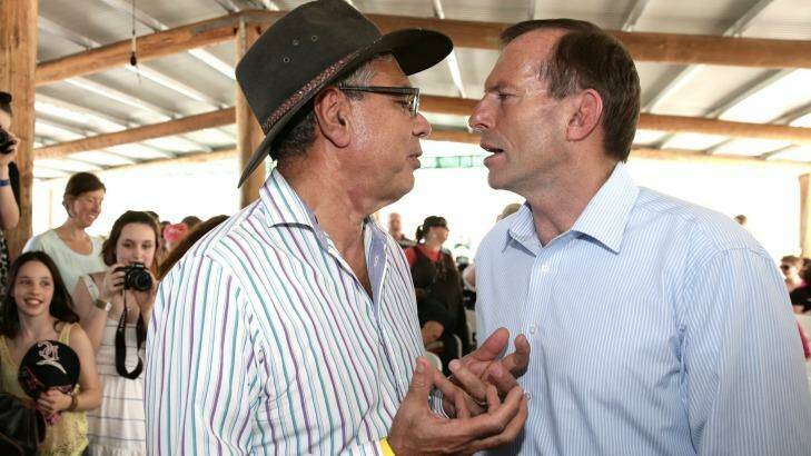 Warren Mundine with former prime minister Tony Abbott during the then opposition leader's visit to Arnhem Land in August 2013.  Photo: Alex Ellinghausen