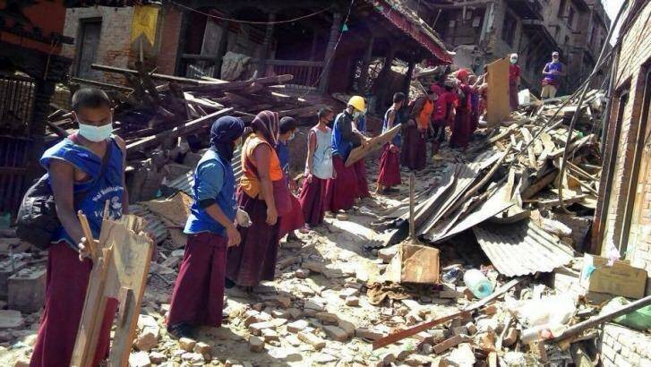 Survivors in Bhaktapur start the daunting task of rescue and recovery. Photo: Pamela Steele Sherpa