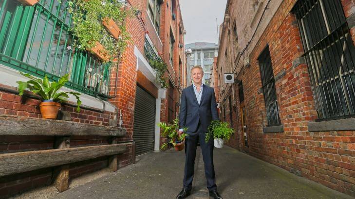 Melbourne City councillor Arron Wood says an innovative project to drive new renewable energy by pooling the purchasing power of a dozen big institutions could become a model for others. Photo: Wayne Taylor