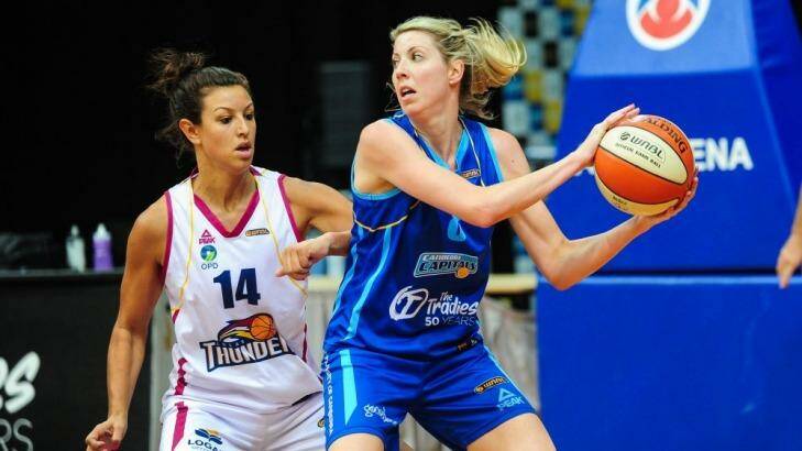 Carly Wilson of the Capitals in action against Logan Thunder last season. The Thunder have folded, which has left south-east Queensland without a top-tier basketball side. Photo: Katherine Griffiths