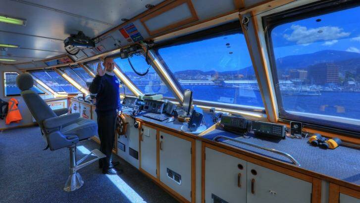 Captain Nathan Clark in the bridge of Coral Expeditions I. Photo: Supplied