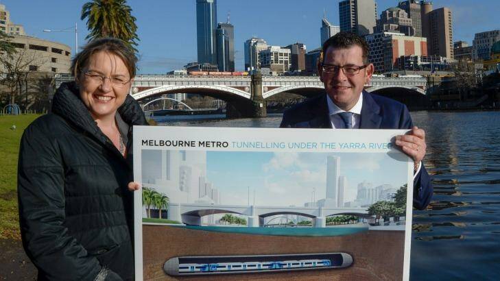 Public Transport Minister Jacinta Allan and Premier Daniel Andrews on the banks of the Yarra on Wednesday.  Photo: Penny Stephens