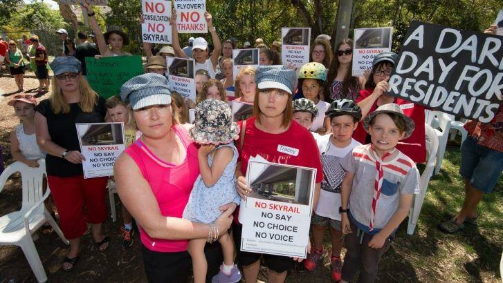Murrumbeena residents Karlee Browning and Tracey Bigg attend a protest against a proposed elevated railway line.  Photo: Penny Stephens