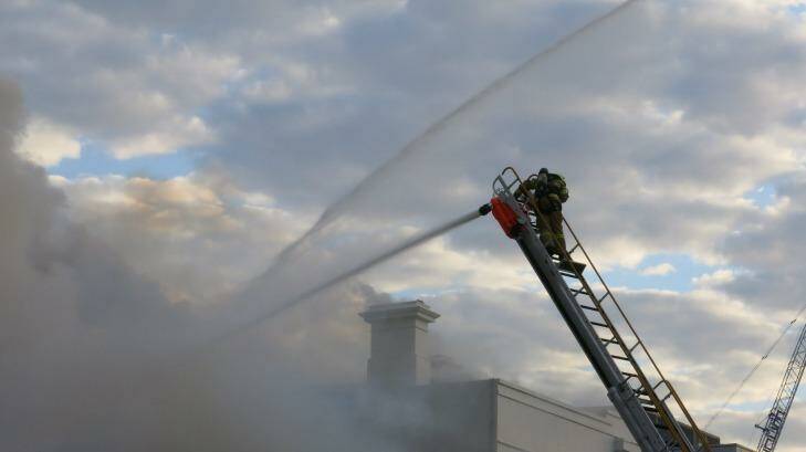 Fire crews battle the blaze. Photo: a