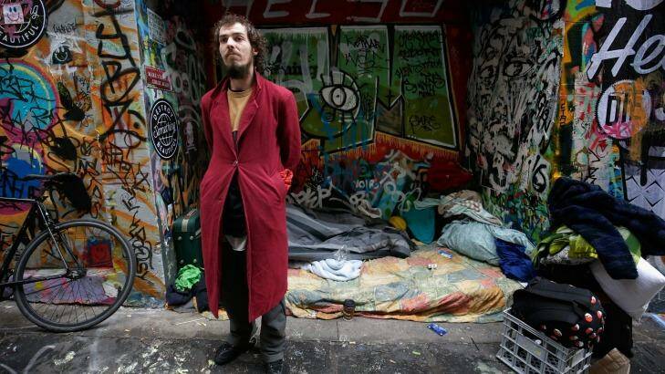 Home for a few days: Tyson Daymond in front of his possessions on Hosier Lane. Photo: Darrian Traynor