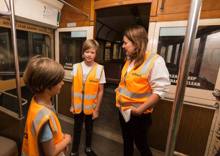 Fiona Larwill, Jimmy 13 (R), Henry 9 (L). The family of the late Melbourne artist David Larwill finally got to see his art tram, which he had thought lost, a year after VicTrack refused their request. Newport, Melbourne. January 4, 2018. Photo: Daniel Pockett