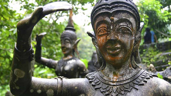 Carved peace: Stone statue in the magic garden at Ko Samui, Thailand. Photo: iStock