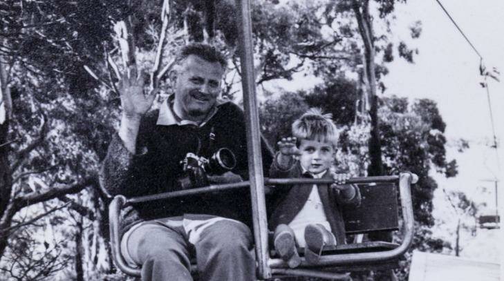 Alan as a child riding the chairlift with his father Vladimir Hajek, who built it. Photo: Daniel Pockett
