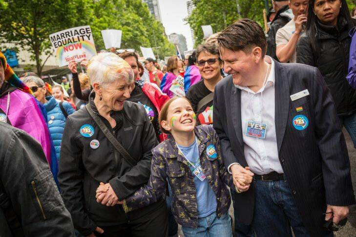 22/10/17 Ro Allen (r), her partner Kaye Bradshaw and their daughter Alex Bradshaw-Allen turned out in support of the Yes vote in an Equal Love rally through Mellbournes CBD. Photograph by Chris Hopkins