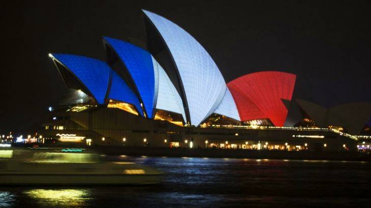 The Sydney Opera House lit up in red, white and blue. Photo: Dominic Lorrimer