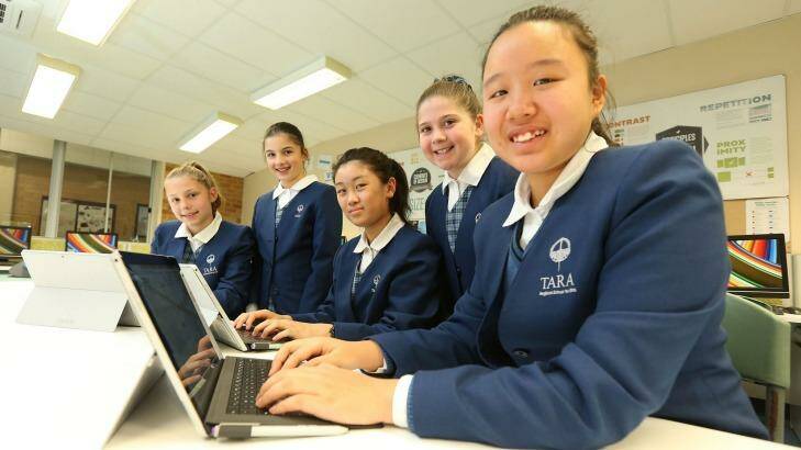 Students(L-R) Sarah Vandebberg, Georgia Grasso, Angie Liu, Erika Dudkin and Alice Shang, at Tara Anglican School in North Parramatta learn to code Photo: Anthony Johnson