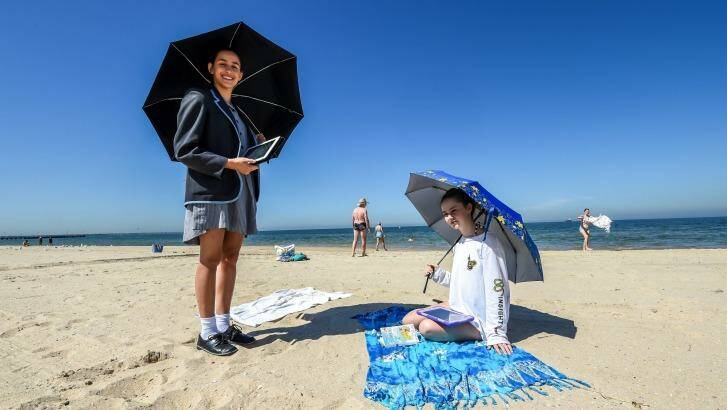 Albert Park College students Sienna Di Benedetto and Christina Burke Broderick on South Melbourne beach. Photo: Justin McManus