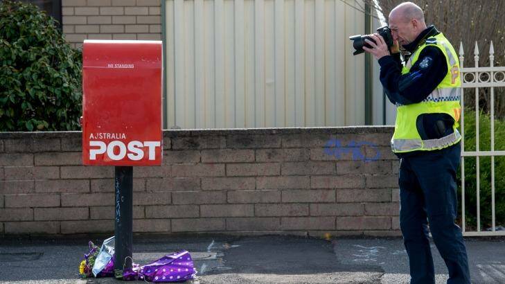 Police investigate the death of cyclist Peter McGuffie in West Footscray on Thursday. Photo: Penny Stephens