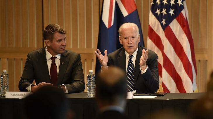 Mr Biden, pictured with Mike Baird, signed a deal for the United States to collaborate with NSW on cancer research. Photo: Wolter Peeters