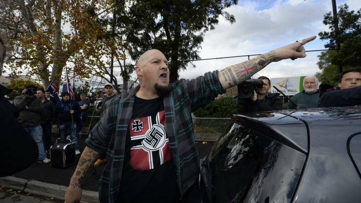 Glenn Anderson shouts at a Muslim woman at an anti-Islam rally in May 2015. Photo: Penny Stephens