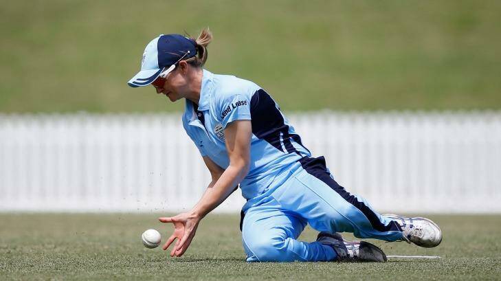 Staying power: Leah Poulton fields for NSW in her 100th match in the Women's National Cricket League. Photo: Daniel Munoz