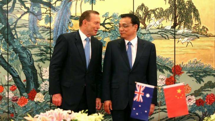 Prime Minister Tony Abbott and Chinese Premier Li Keqiang meet during Mr Abbott's visit to the country. Photo: Alex Ellinghausen