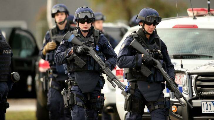 Victoria Police Special Operations Group (SOG) members are seen outside the Metropolitan Remand Centre in Ravenhall where inmates are reportedly rioting in response to a smoking ban that is due to come into effect on the 1st of July on June 30, 2015 in Melbourne, Australia.  (Photo by Pat Scala/Fairfax Media) Photo: Pat Scala