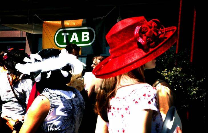 CUP 031104 AFR photo Tamara Voninski
The Melbourne Cup Day celebrations at King Street Wharf in Sydney today featuring street performers including this jockey and horse as well as fashion shows.
generic melbourne cup horse racing tab bet betting gamble gambling fashin hat hats SPECIALX 21498