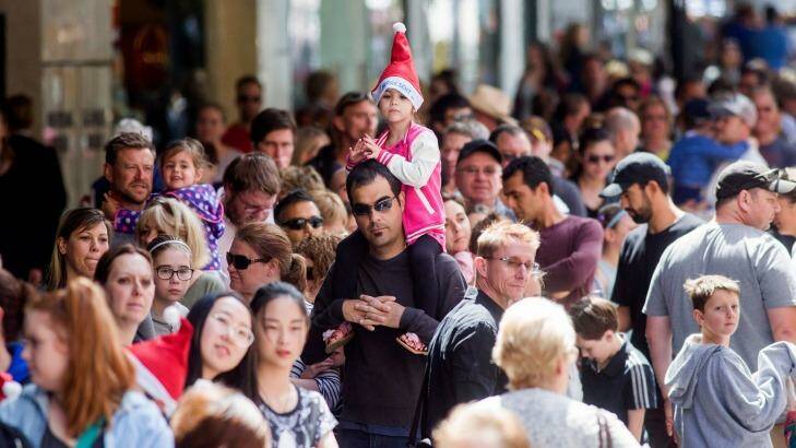 Christmas shopping crowds filled the Bourke Street mall for a frenzy of last-minute buying on Sunday. Photo: Paul Jeffers