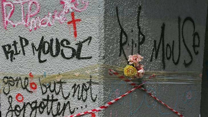 Graffiti at the site where homeless man Wayne 'Mouse' Perry was killed. Photo: Scott Barbour
