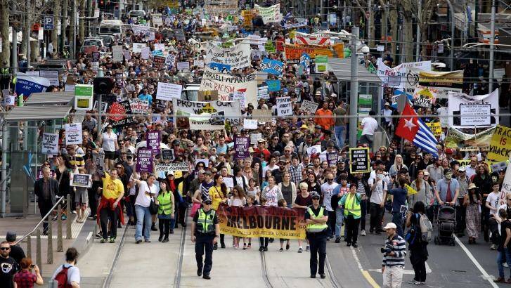 Protesters rally against the Abbott government's policies in Melbourne Photo: Angela Wylie