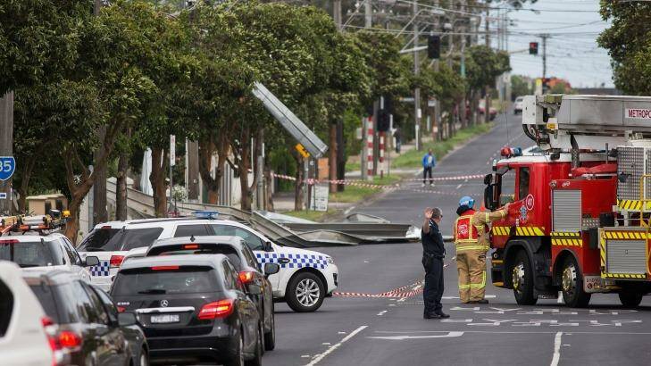 The roof laid in the middle of the road in Essendon on Sunday, causing disturbance to traffic flow. Photo: Paul Jeffers