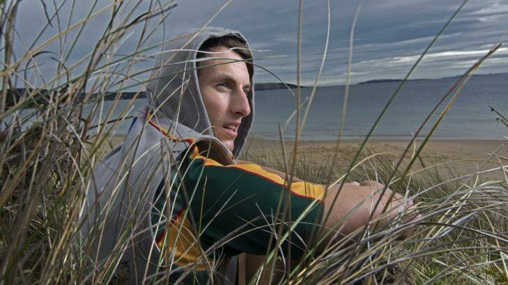 Island life: Ryan Lees on the beach at his home on Flinders Island. Photo: Michael Rayner