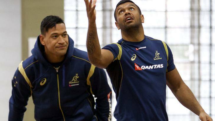 Still at 10 ... Kurtley Beale, right, at training with Israel Folau. Photo: Wolter Peeters
