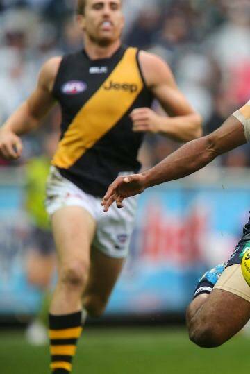 Travis Varcoe is only a '50-50' chance to remain a Cat. Photo: Pat Scala