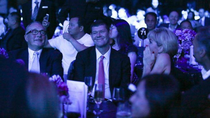 Lloyd WIlliams and his friend James Packer watch Mariah Carey perform at Crown Casino New Year's Eve 2015. Photo: Regina Karon