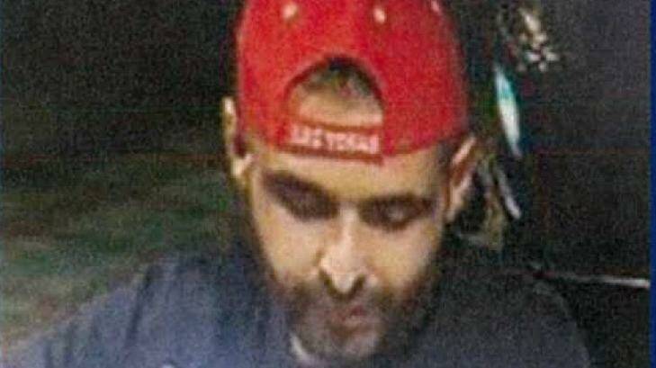Police believe a red-hatted burglar is on a crime spree through Melbourne's northern suburbs. Photo: Victoria Police