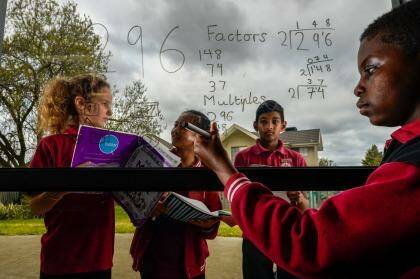 Year 6 students Holly, Nobel, Andrew and Joshua from Harrisfield Primary School in Noble Park. The school has performed well in NAPLAN. Photo: Penny Stephens