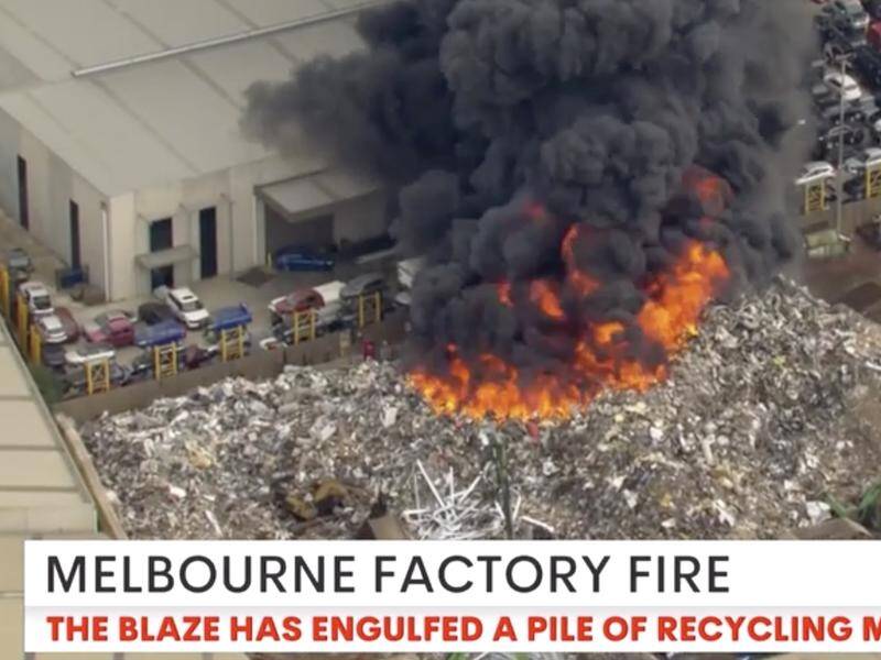 The fire in a large pile of scrap metal at a recycling plant has sent smoke across Melbourne. (HANDOUT/7 NEWS)