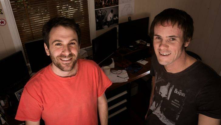 Matt Knights, left and Dean Loades, right, have started their own gaming company in the spare room of Mr Loades' home in Annerley. Photo: Supplied