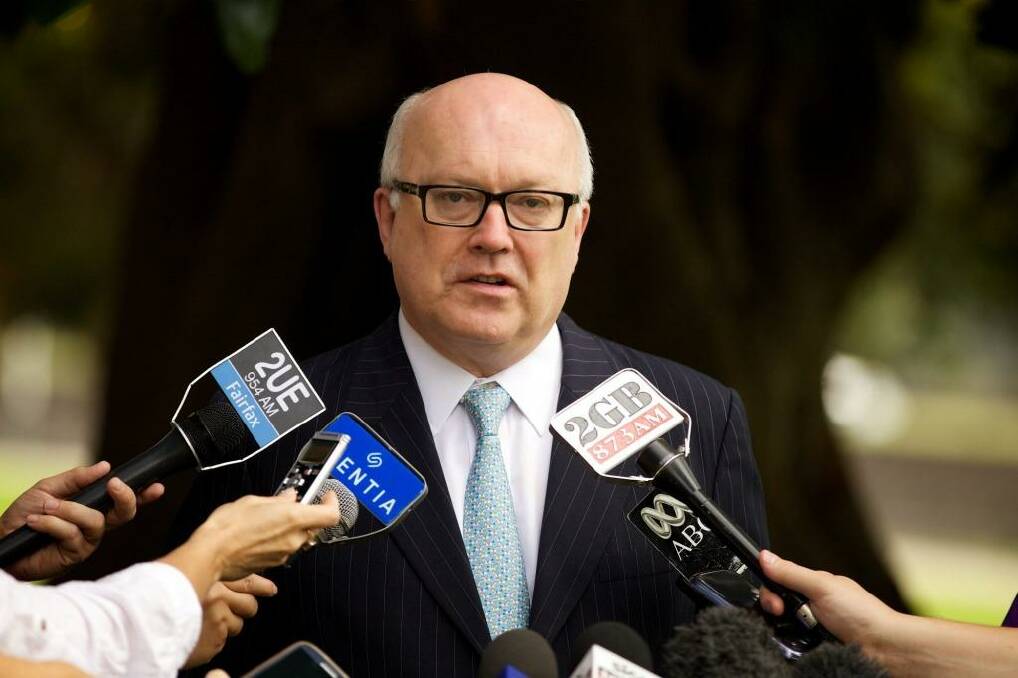 Attorney-General George Brandis says the government 'foreign fighers bill' is crucial to fighting terrorism in the age of Islamic State. Photo: Wolter Peters