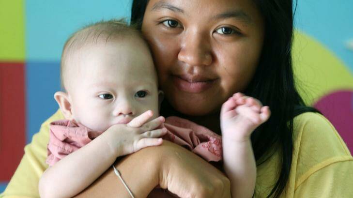 Surrogate mother Pattharamon Janbua with baby Gammy. Photo: Apichart Weerawong