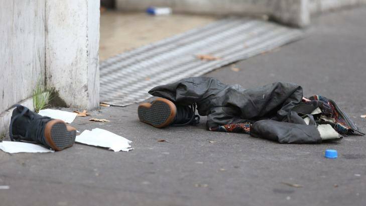 Discarded shoes outside the Bataclan theatre. Photo: Andrew Meares