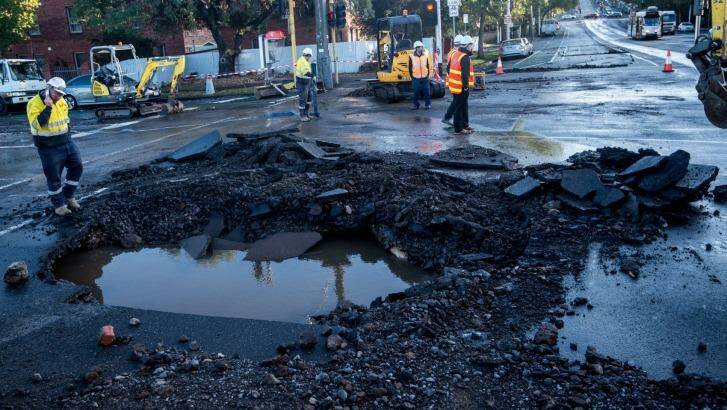 Burst water main on the corner of Arden and Abbotsford Streets in North Melbourne. Photo: Justin McManus