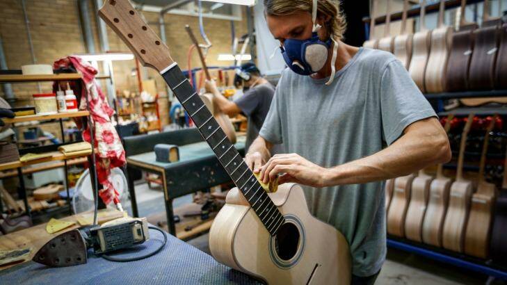 A guitar being made at Maton Guitars' Box Hill factory. Photo: Eddie Jim