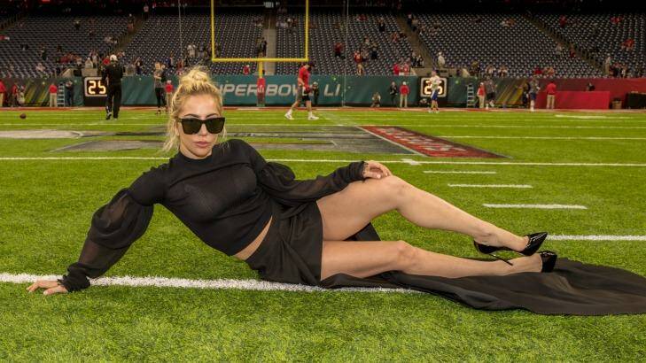 Lady Gaga poses on the field before the Super Bowl at NRG Stadium on Sunday in Houston, Texas. Photo: Christopher Polk
