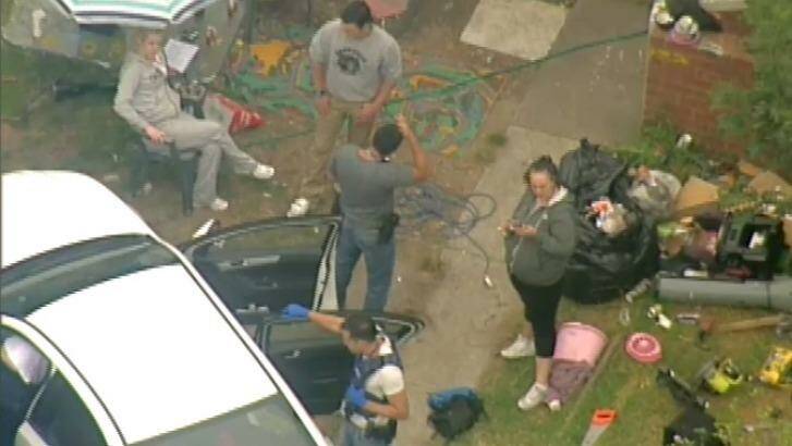 Police at the house in Ashburton where some of the escapees from Malmsbury were arrested. Photo: Courtesy of Nine News