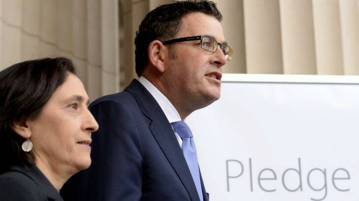 Victorian  Premier Daniel Andrews and Minister Lily D'Ambrosio promise net zero emissons by 2050.  Photo: Penny Stephens