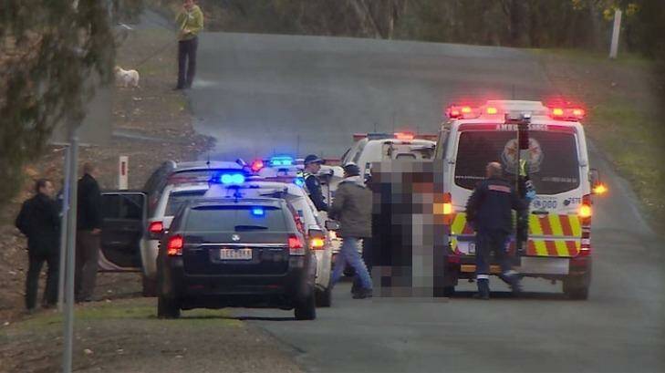 The Bendigo teen is helped into an ambulance after being found in Maiden Gully. Photo: Julian Fisher/Nine News