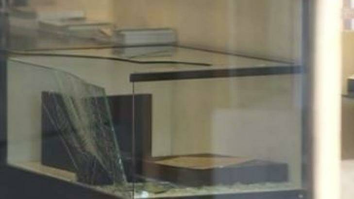 One of the smashed cabinets in the Holloway Diamonds store. Photo: Courtesy of Seven News