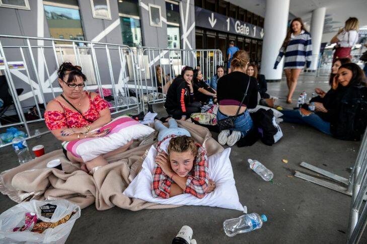 The Age, News 10/03/2017, picture by Justin McManus. Justin Beiber fans camp out for the concert tonight at Etihad Stadium. Lilly Nash with her mother Sandra (who is holding a spot for Lillies friends). They have been camped out since 4.30am.
