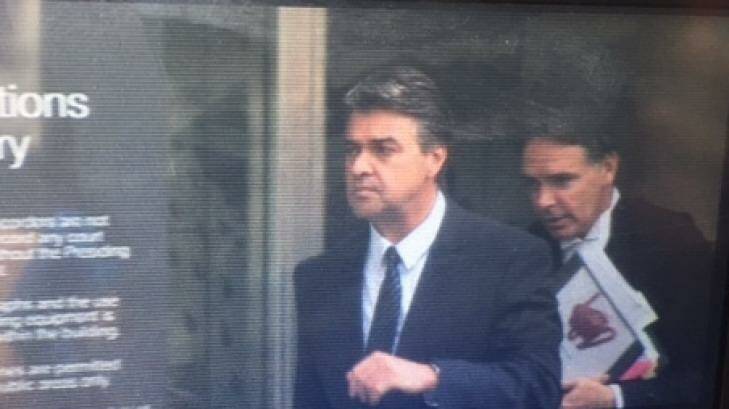 Former police officer Guy Felton leaves court after being sentenced for family violence against his ex-wife and son. Photo: Channel 10